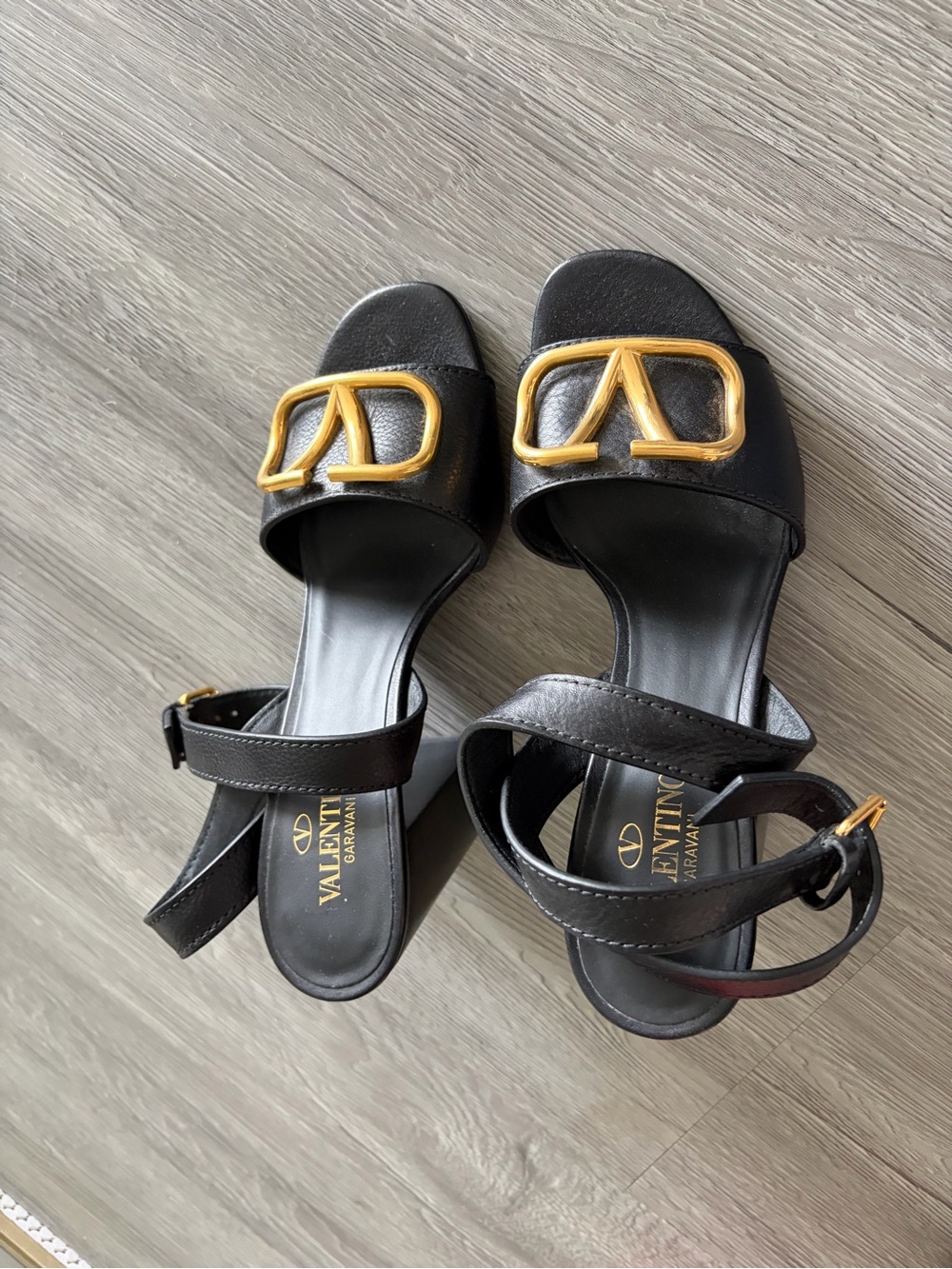 Valentino Garavani Black Leather Sandals with Gold V Logo